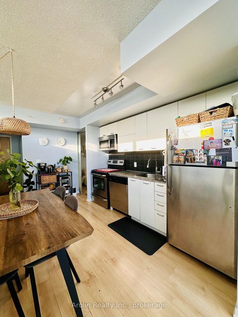 Photo 5 at 212 - 20 Joe Shuster Way, South Parkdale, Toronto