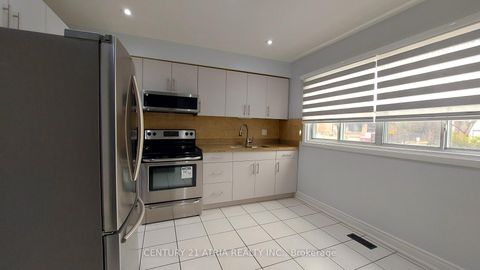 Photo 8 at 143 Purpledusk Trail, Morningside, Toronto