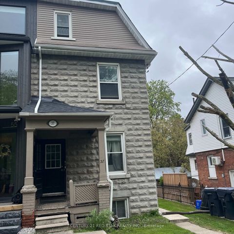 Photo 2 at 57 Humberside Avenue, High Park North, Toronto