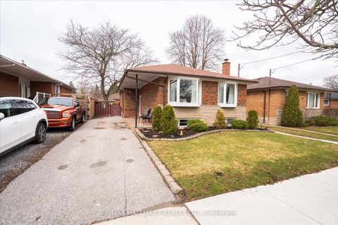 Photo 2 at 7 Grassington Crescent, Woburn, Toronto