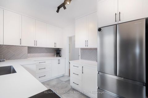 Photo 8 at 32 Kim Court, Kennedy Park, Toronto