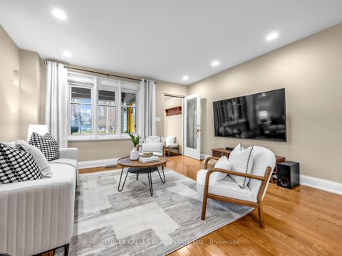 Photo 1 at 71 Dentonia Park Avenue, Crescent Town, Toronto