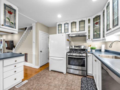 Photo 17 at 71 Dentonia Park Avenue, Crescent Town, Toronto