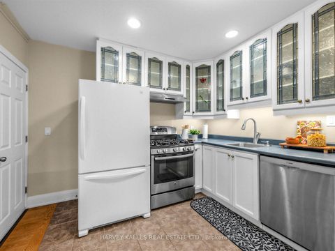 Photo 18 at 71 Dentonia Park Avenue, Crescent Town, Toronto