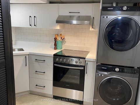 Photo 30 at 71 Dentonia Park Avenue, Crescent Town, Toronto