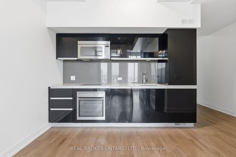 Photo 7 at 1127 - 20 Minowan Miikan Lane, Little Portugal, Toronto