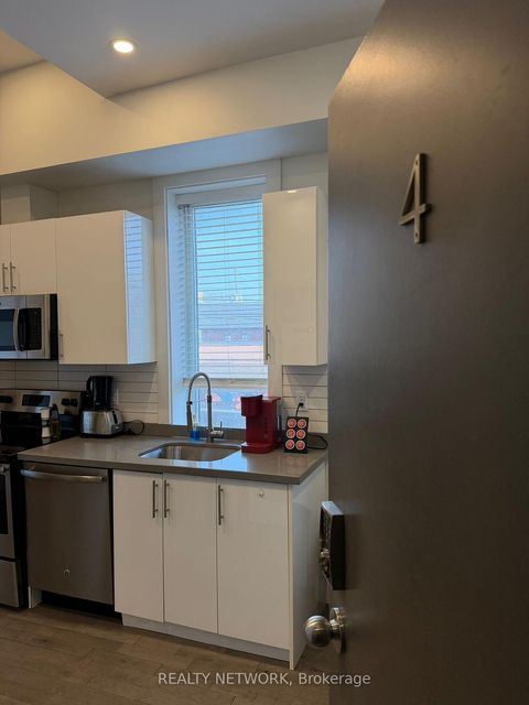 Photo 8 at 1415 Gerrard Street E, Coxwell, Toronto