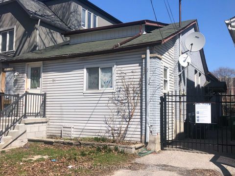 Photo 1 at 21 Eastdale Avenue, Crescent Town, Toronto