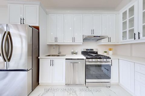 Photo 11 at 15 Malta Street, Cliffside, Toronto