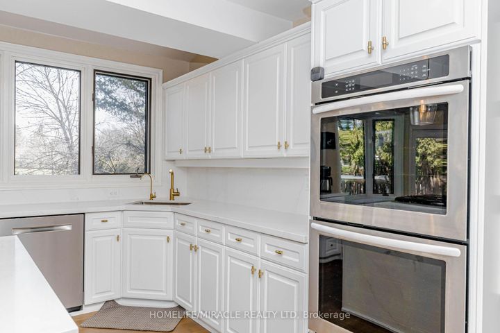 Photo 23 at 253 McCraney Street W, CP College Park, Oakville