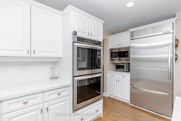 Photo 24 at 253 McCraney Street W, CP College Park, Oakville