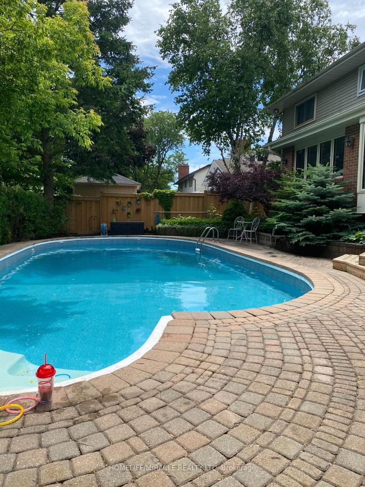 Photo 47 at 253 McCraney Street W, CP College Park, Oakville