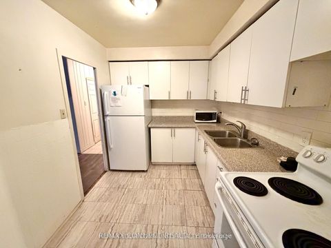 Photo 5 at 206 - 825 Kennedy Road, Ionview, Toronto