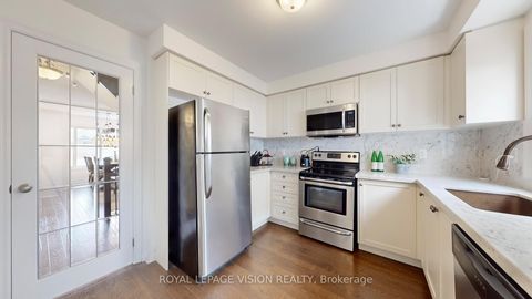 Photo 11 at 32 Zezel Way, Dorset Park, Toronto