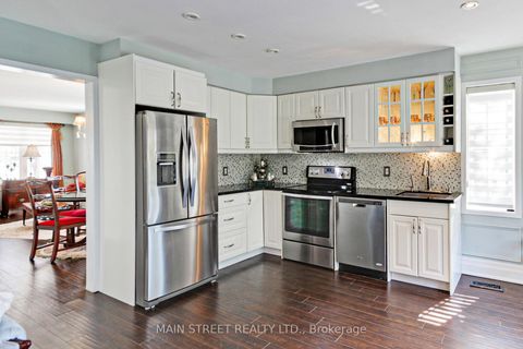 Photo 9 at 108 Hollandview Trail, Bayview Wellington, Aurora