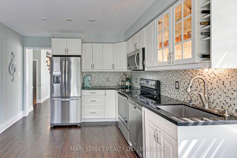 Photo 11 at 108 Hollandview Trail, Bayview Wellington, Aurora