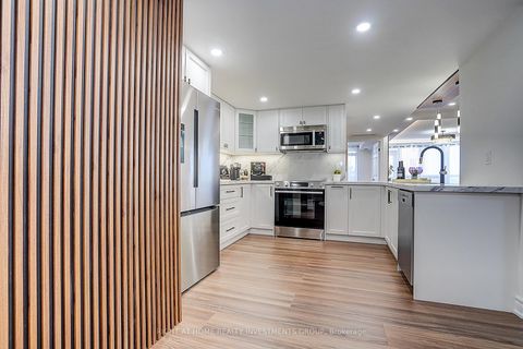 Photo 10 at 511 - 89 Skymark Drive, Hillcrest Village, Toronto