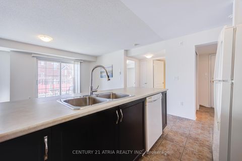 Photo 6 at 5 - 129 Isaac Devins Boulevard, Pelmo Park W5, Toronto