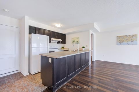 Photo 7 at 5 - 129 Isaac Devins Boulevard, Pelmo Park W5, Toronto