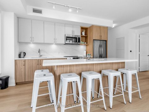 Photo 5 at 6 - 22 Lytham Green Circle, Glenway Estates, Newmarket