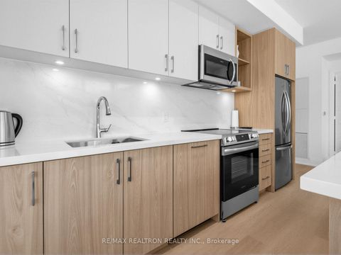 Photo 7 at 6 - 22 Lytham Green Circle, Glenway Estates, Newmarket