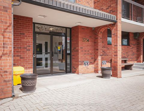 Photo 1 at 203 - 3734 St Clair Avenue E, Cliffcrest, Toronto