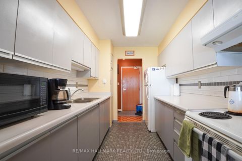 Photo 2 at 203 - 3734 St Clair Avenue E, Cliffcrest, Toronto