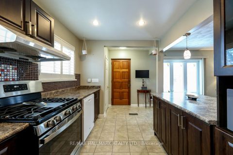 Photo 1 at 12 Trinnell Boulevard, Birchmount, Toronto