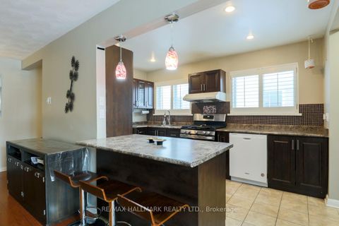 Photo 2 at 12 Trinnell Boulevard, Birchmount, Toronto