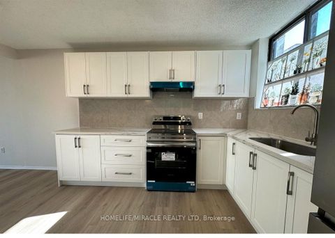 Photo 1 at 303 - 665 Kennedy Road, Kennedy Park, Toronto