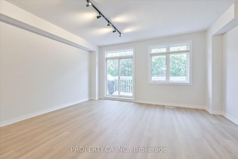 Photo 9 at 46 - 1051 On Bogart Circle, College Manor, Newmarket