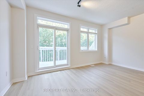 Photo 12 at 46 - 1051 On Bogart Circle, College Manor, Newmarket