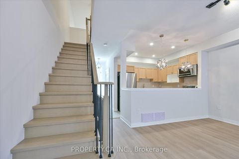 Photo 15 at 46 - 1051 On Bogart Circle, College Manor, Newmarket