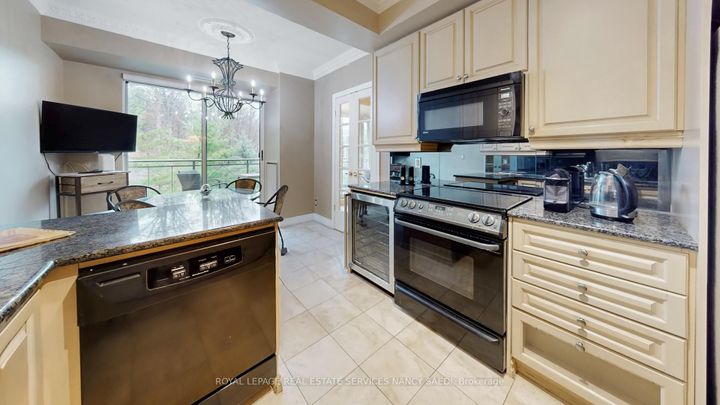 Photo 12 at 603 - 11 William Carson Crescent, Windfields, Toronto