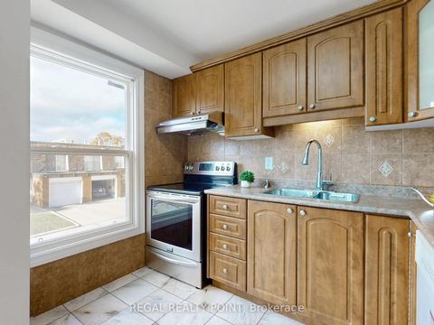 Photo 12 at 63 - 100 Bridletowne Circle, L'Amoreaux, Toronto