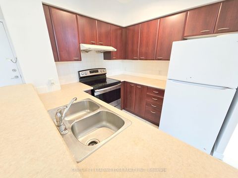 Photo 7 at TH120 - 38 Lee Centre Drive, Woburn, Toronto