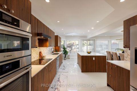 Photo 10 at 132 Princess Anne Crescent, Rosethorn, Toronto