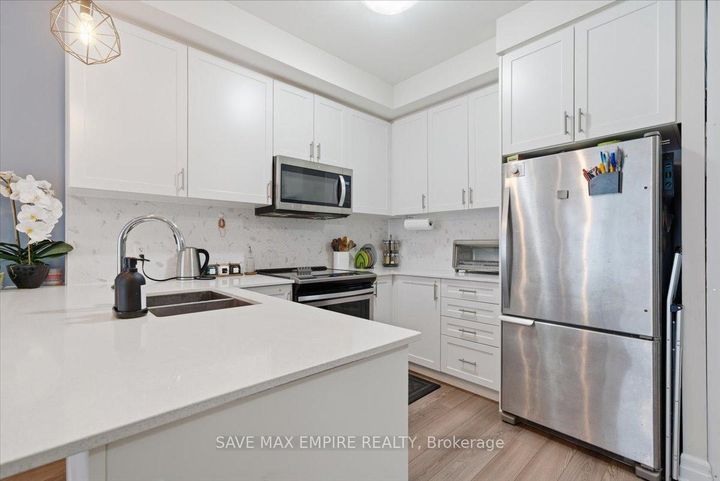 Photo 7 at 227 - 652 Cricklewood Drive, Mineola, Mississauga