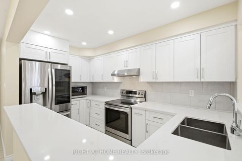 Photo 5 at 212 Venice Gate Drive, Vellore Village, Vaughan