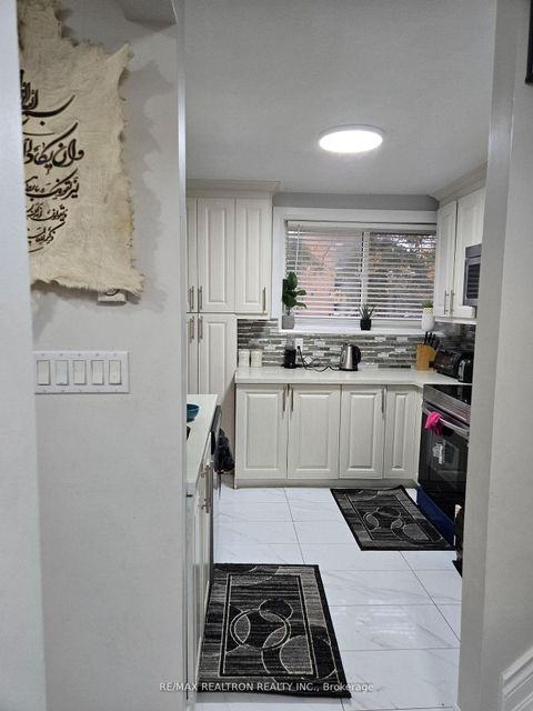 Photo 4 at 885 - 36 Tandridge Crescent, Old Rexdale, Toronto