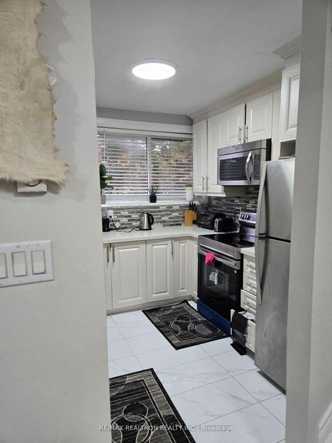 Photo 24 at 885 - 36 Tandridge Crescent, Old Rexdale, Toronto