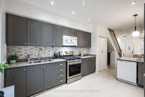 Photo 11 at 216 Parkmount Road, Coxwell, Toronto