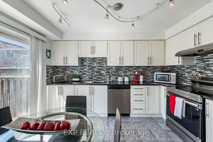 Photo 12 at 53 Sweetwood Circle, Fletcher's Meadow, Brampton