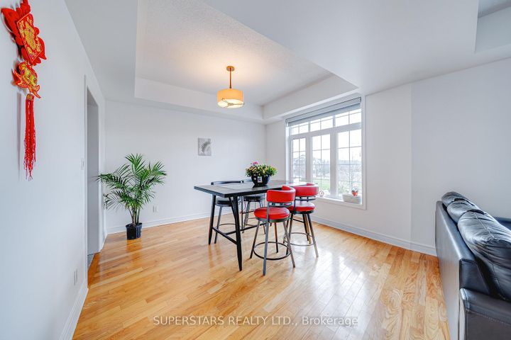 Photo 5 at 22 - 30 Greensborough Village Circle, Greensborough, Markham