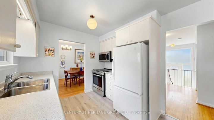 Photo 16 at 72 Romfield Circuit, Royal Orchard, Markham