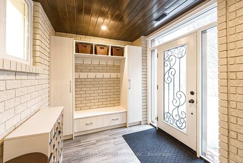 Photo 4 at 25 Whispering Pine Trail, Aurora Heights, Aurora