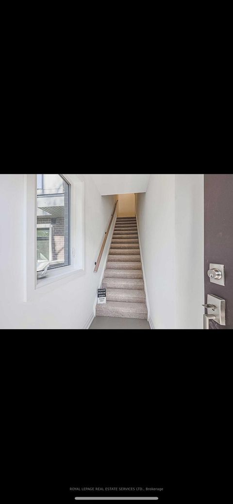 Photo 2 at 23 - 28 Marina Avenue, Long Branch, Toronto