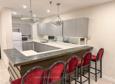 Photo 5 at 708 - 2460 Eglinton Avenue E, Eglinton East, Toronto