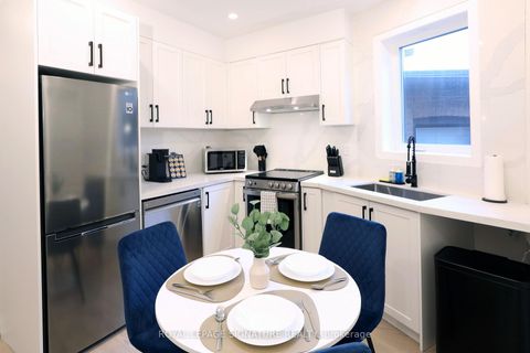 Photo 2 at 36 Tennis Crescent, North Riverdale, Toronto