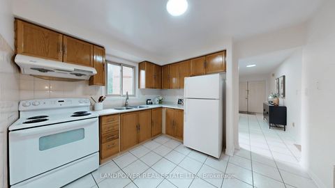 Photo 10 at 64 - 10 Cardwell Avenue, Malvern West, Toronto